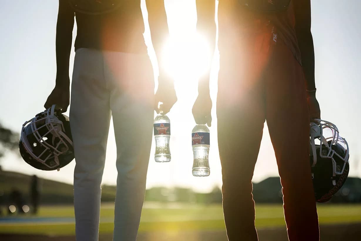Football player with Ozarka water