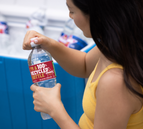 woman drinking ozarka spring water