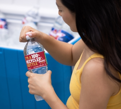 woman drinking ozarka spring water